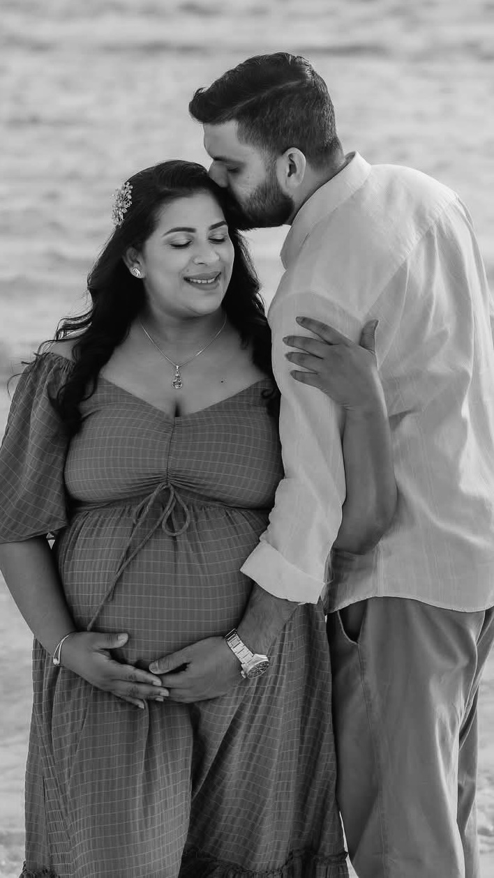 Expectant couple sharing a moment